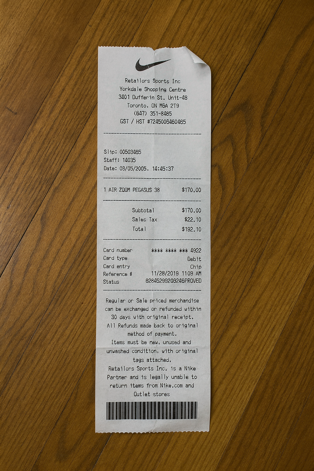 Nike on Wooden Floor — AI